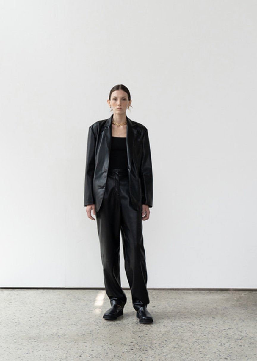 Curved eco leather pants (black)